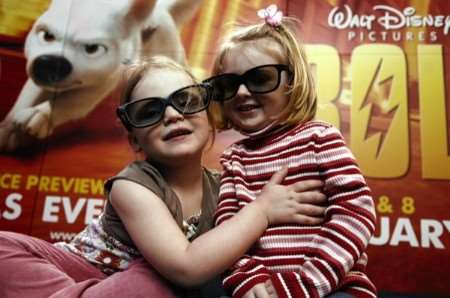 Rachel Zigler and Isabel Llewellyn, both aged three, get ready to watch Disney's new film Bolt in 3D at the Odeon Cinema, Lockmeadow, Maidstone. Picture: Matthew Walker