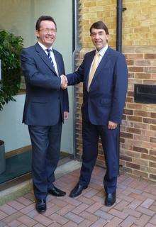 New partner Romano Obertelli, left, welcomed by John Sheath, managing partner Brachers.
