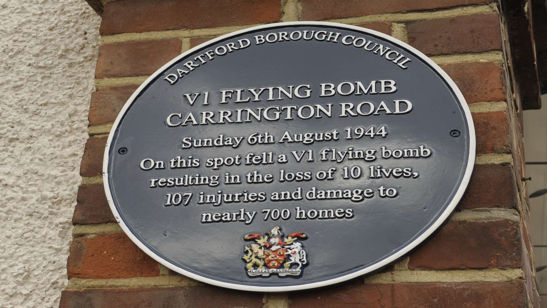 This plaque now sits on the house which a V-1 flying bomb dropped, just four houses away from where Mrs Gallop was hiding in an air aid shelter