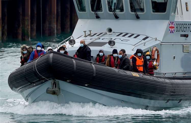 A group of people are brought in to Dover, Kent, onboard a Border Force vessel following a small boat incident in the Channel. Picture: Gareth Fuller/PA (56078108)