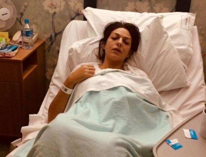 Nicole Elkabbass shared this photo of her supposedly having cancer treatment in hospital, when it was actually taken after she had her gall bladder removed