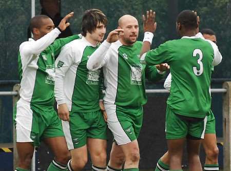 Thamesmead celebrate scoring on their way to victory over Faversham and the Kent League title