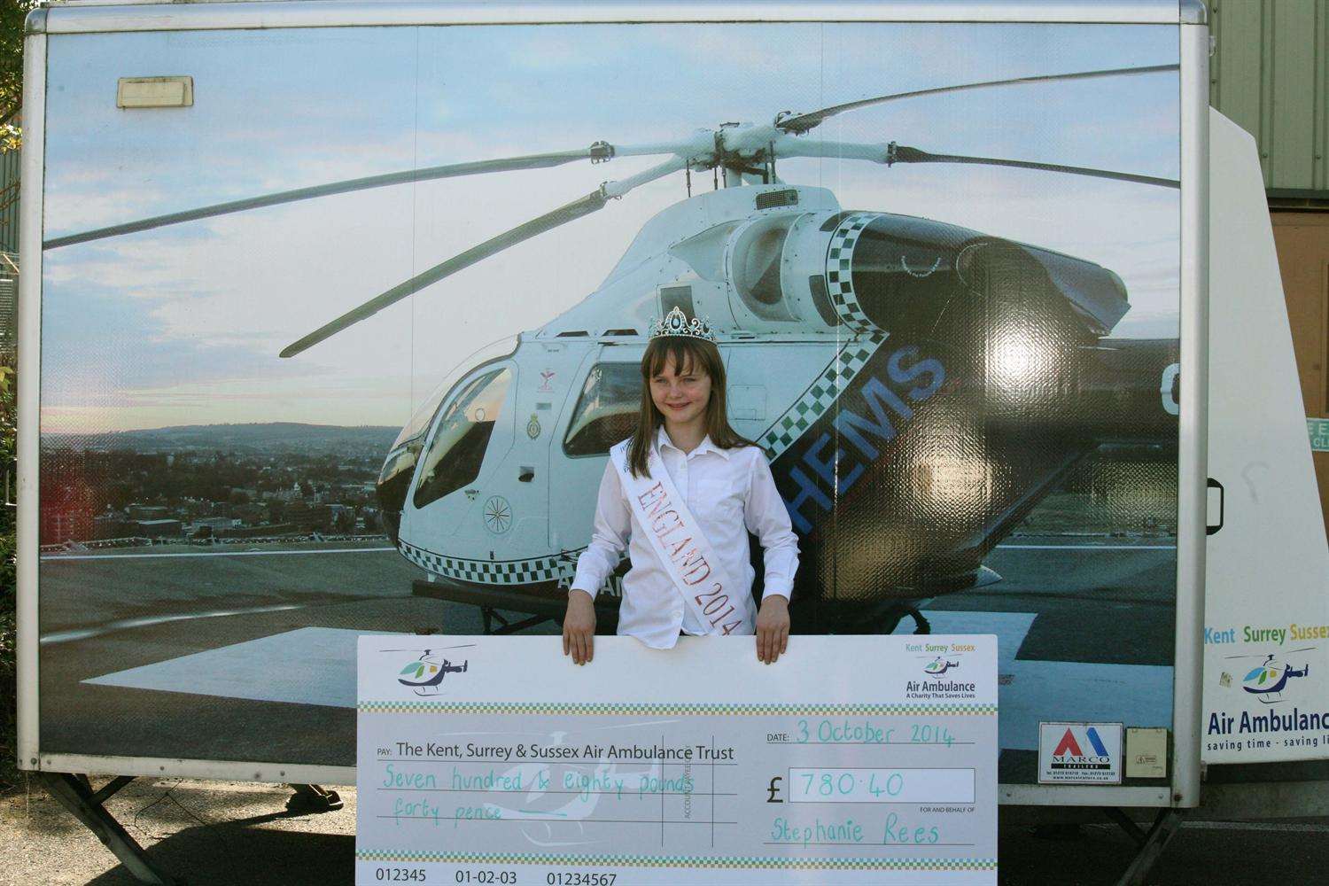 Stephanie Rees with the cheque she raised for the air ambulance