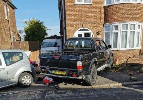 A Mitsubishi pick-up truck crashed through a brick wall in St Helen's Road, Sheerness. Picture: Michael Gilbert