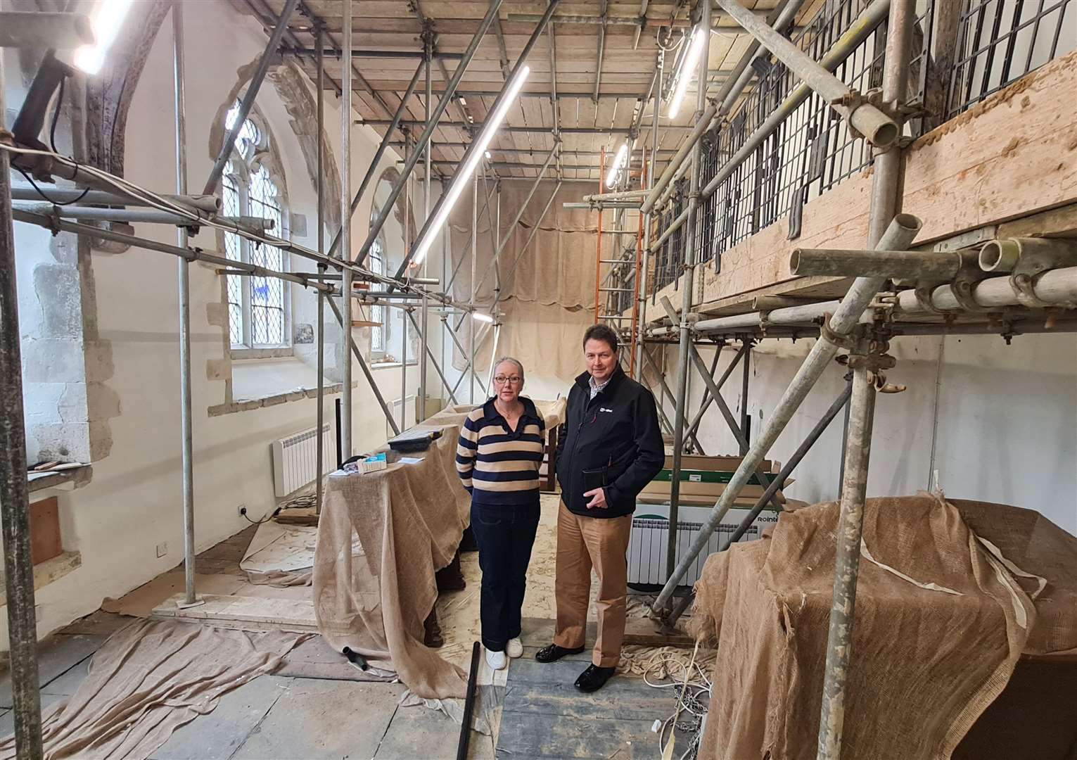 Eastbridge Hospital Clerk and Receiver Louise Knight with trustee Nick Rooke in the upper chapel which is undergoing restoration