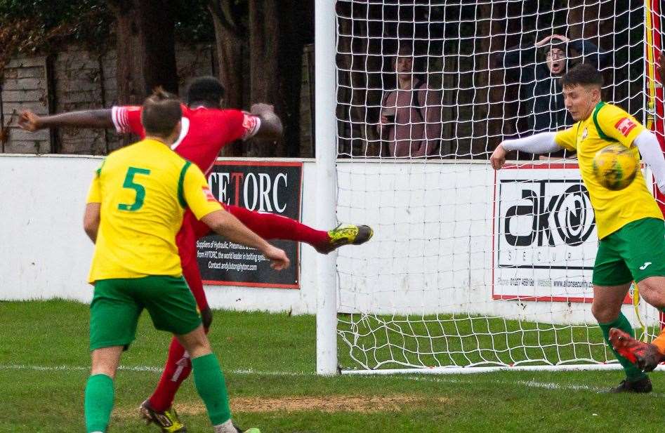 Kemo Darboe scores for the Oysterman during their 2-2 draw with Corinthian on Saturday. Picture: Les Biggs