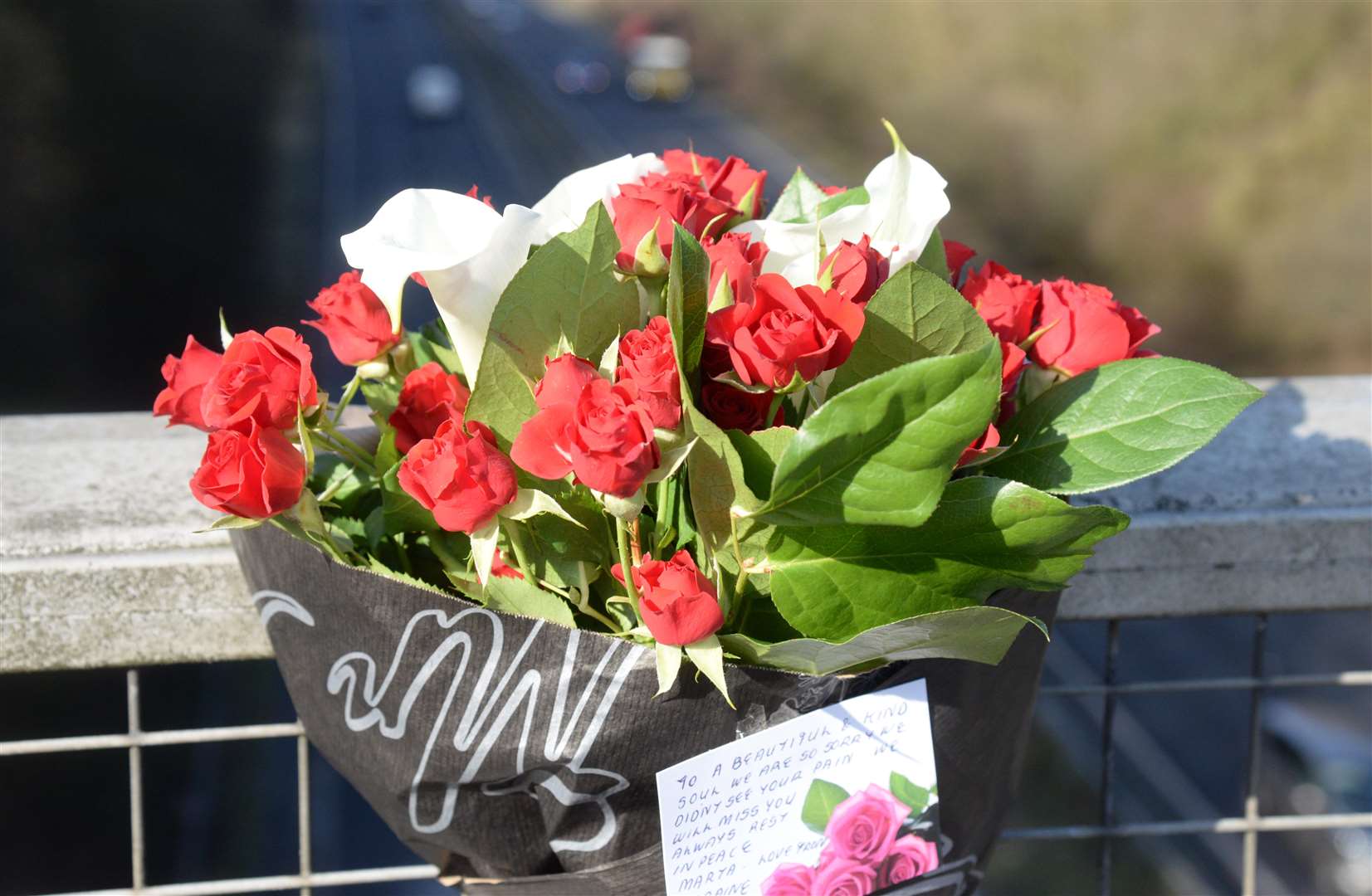 A Floral tribute on the Gracious Lane Bridge in Sevenoaks on Thursday. Picture: Chris Davey... (7366484)