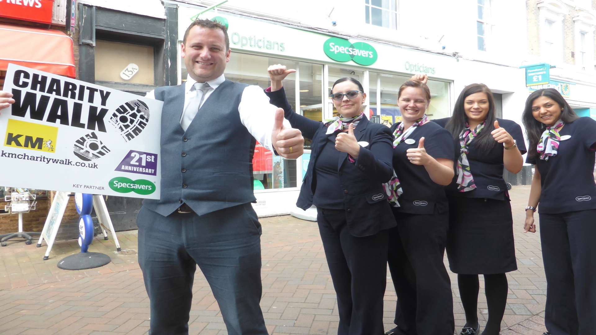 Specsavers Kent Regional Chairman Matt Trusty and staff show their support for the 21st KM Charity Walk staged on Sunday, June 26 from Mote House, Maidstone