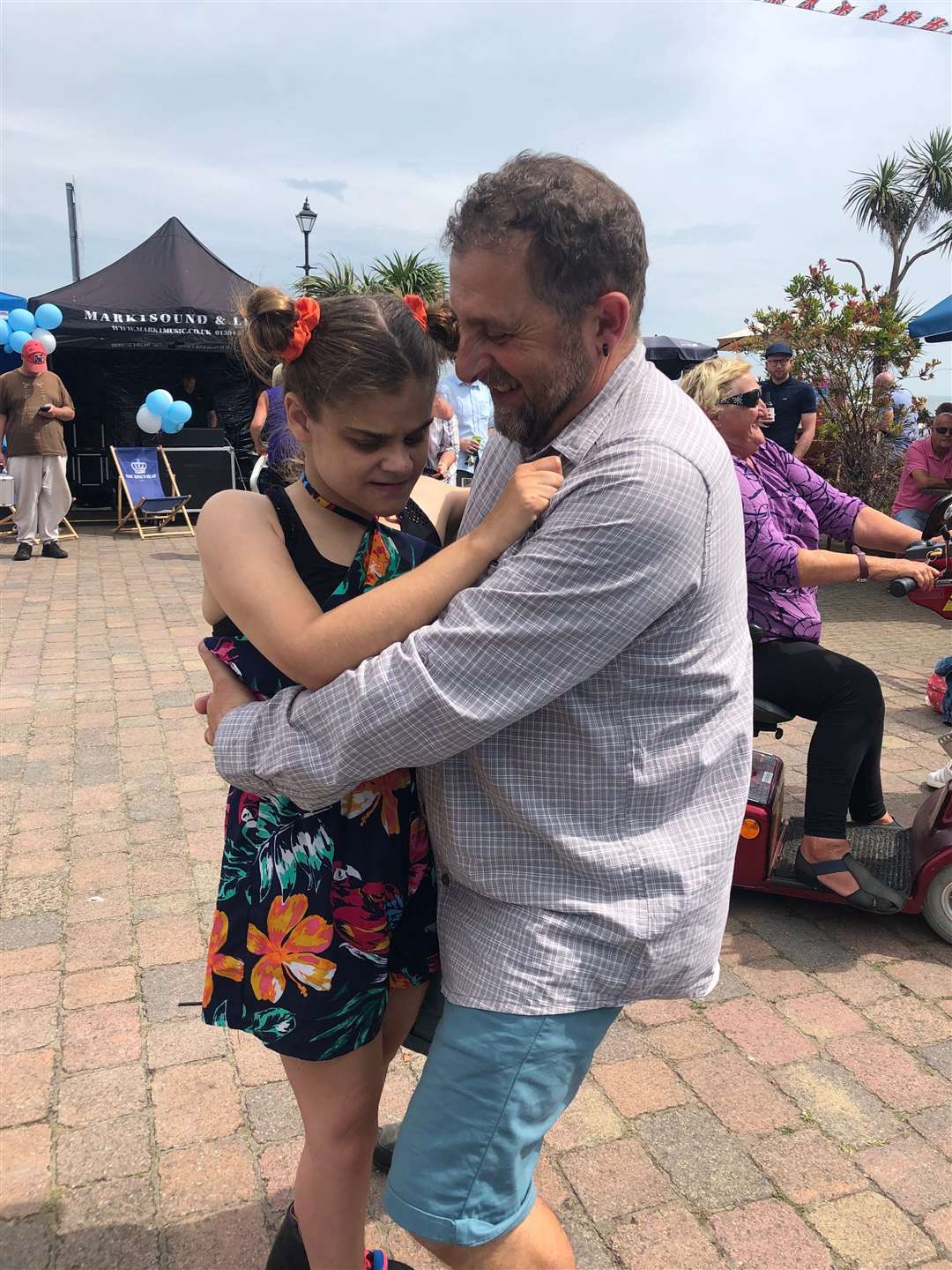 Brett Martin with his daughter Charlotte dancing together at a charity fundraiser in August 2019