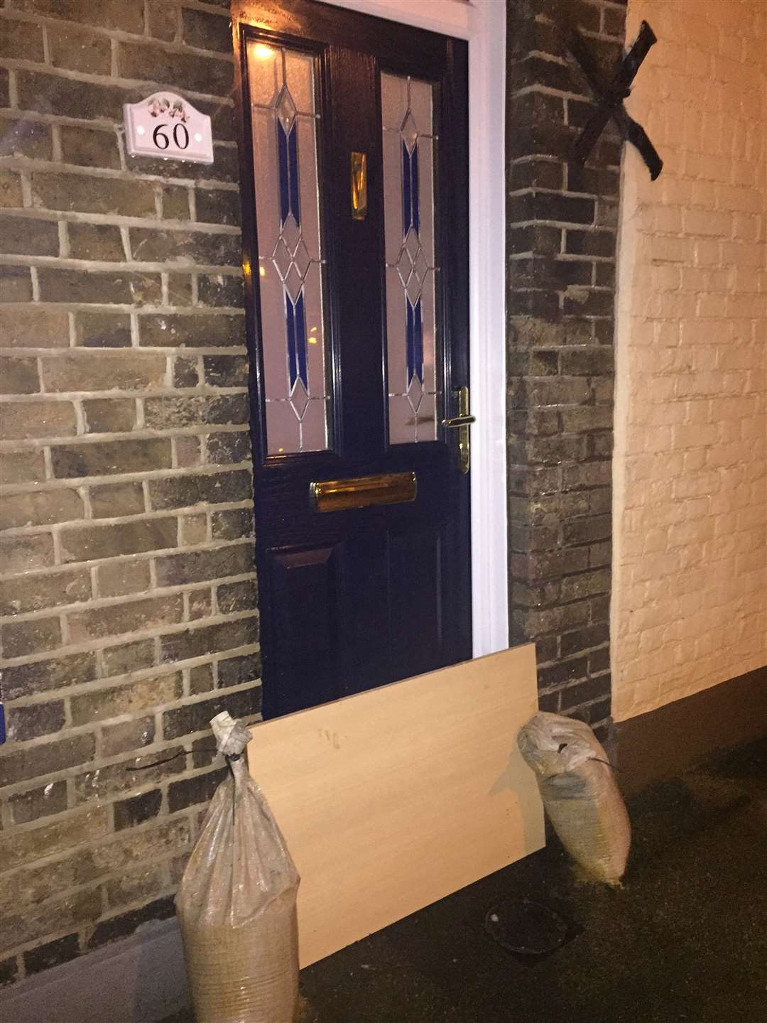 Residents protected their homes with boards and sandbags