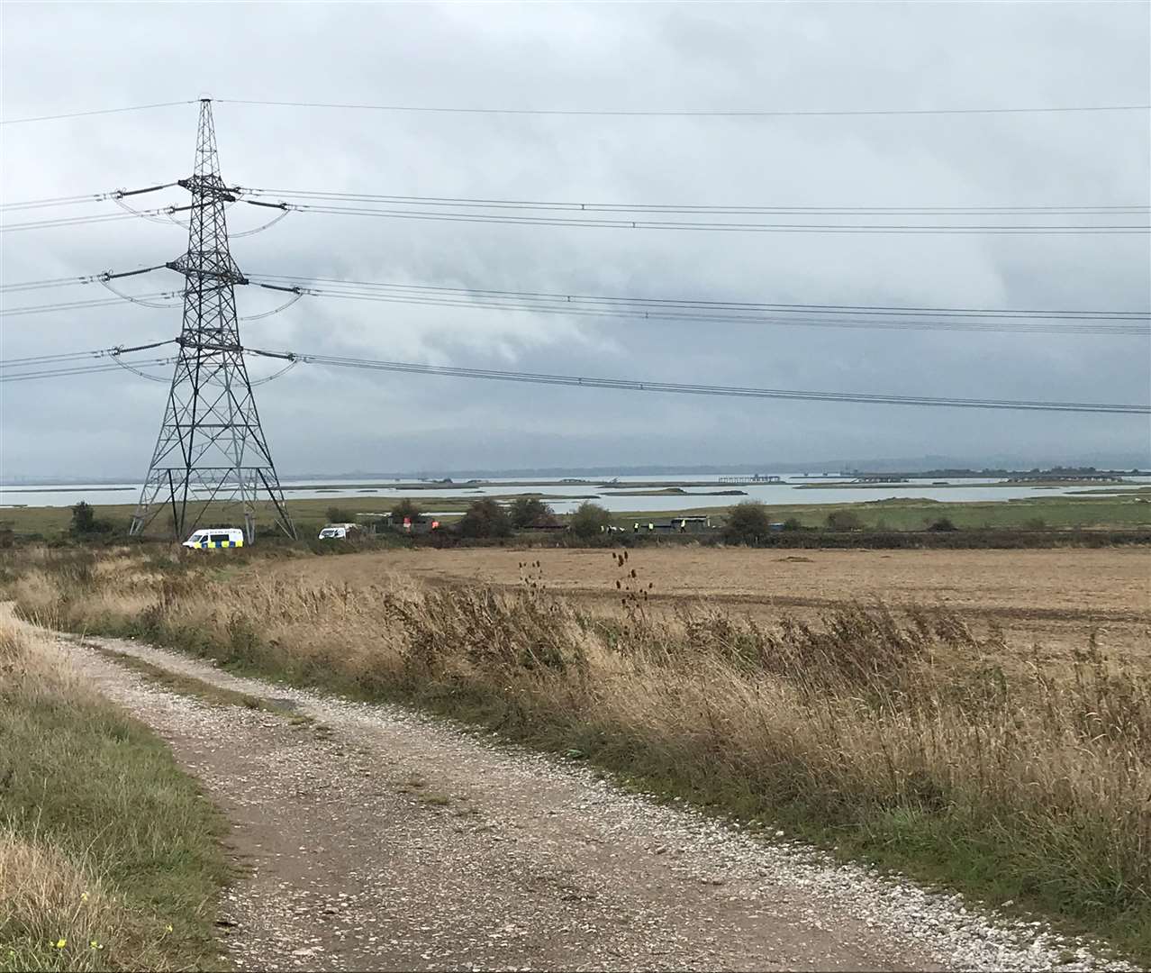 Police and volunteers scoured the fields off Stoke Road in the search for Liam