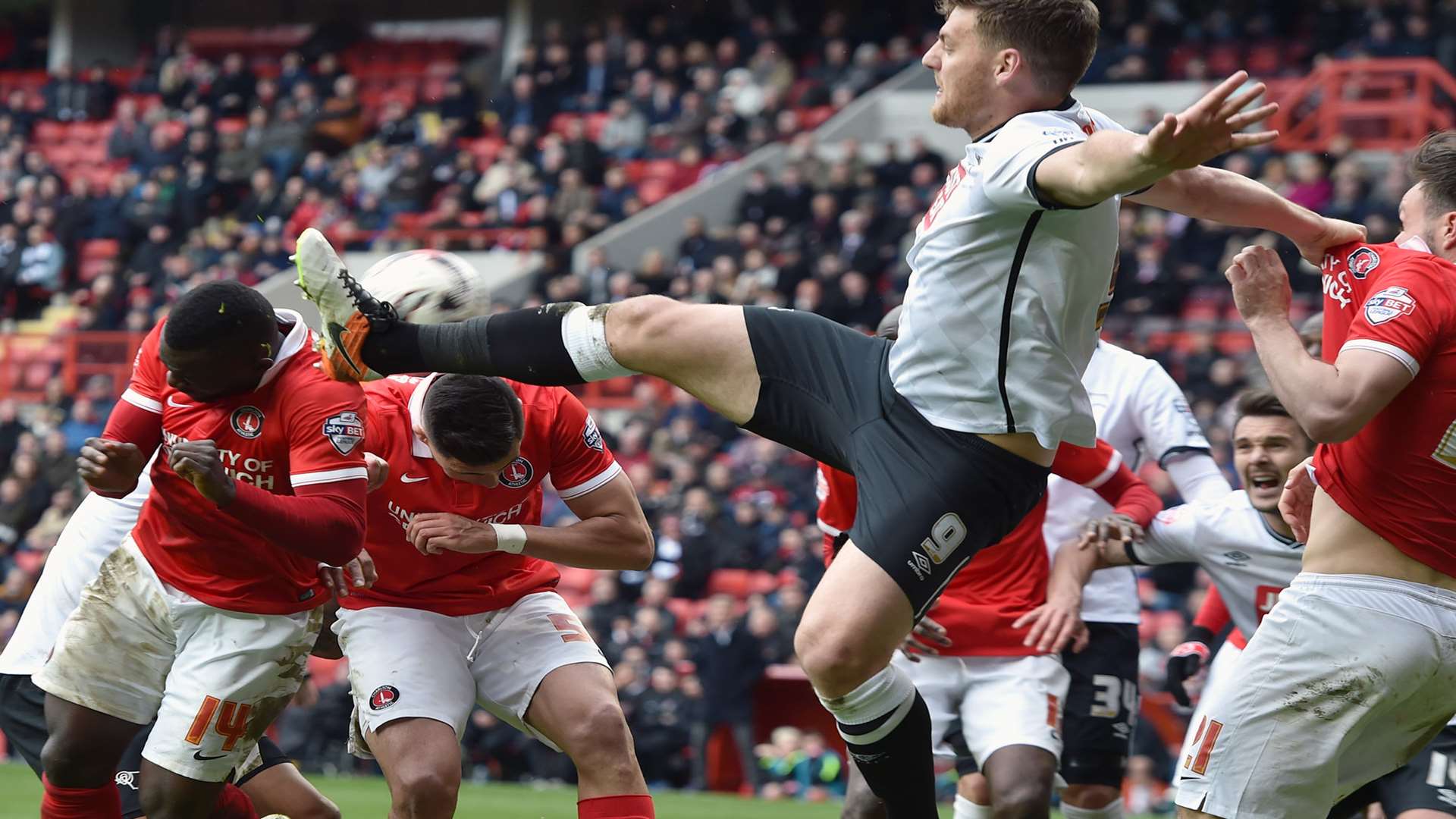 Igor Vetokele goes in where it hurts but his header hits the woodwork in Charlton's defeat to Derby on Saturday Picture: Keith Gillard