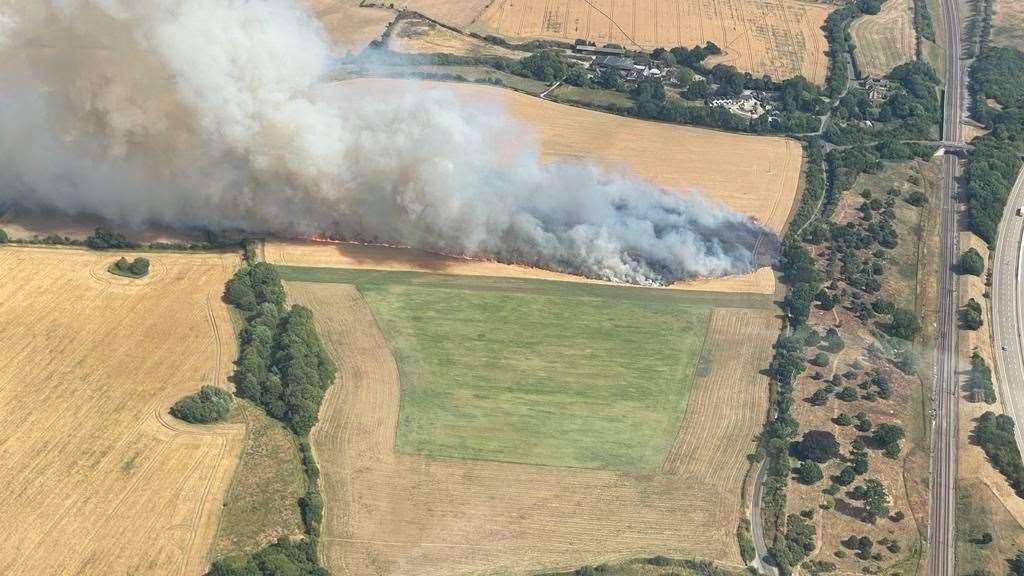 The fire spread across about 20 acres of farmland near Lenham Heath. Picture: Kiran Reardon