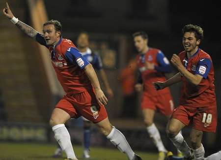 Goalscorer Danny Kedwell points the way for Gillingham