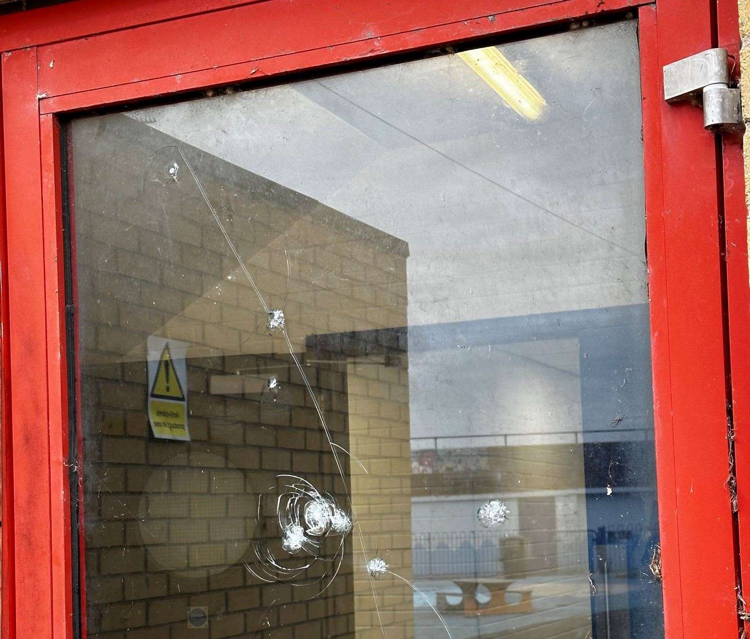 One of the property's doors was smashed by thugs overnight. Picture: Sheppey Leisure Complex