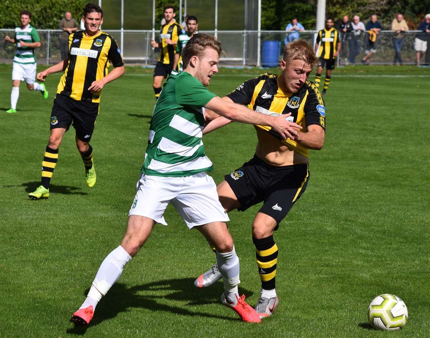 Corinthian (green) get to grips with Hebburn Town. Picture: Alan Coomes