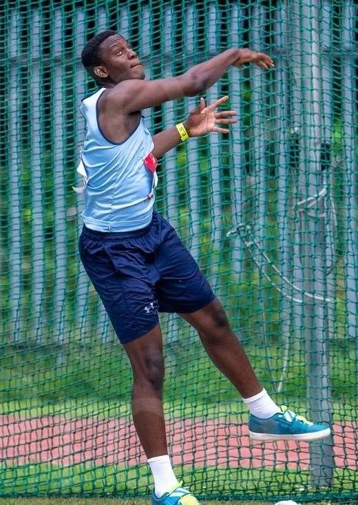 Gravesend's Timi Babatunde in discus action at the School Games National Finals. Picture: PA Media