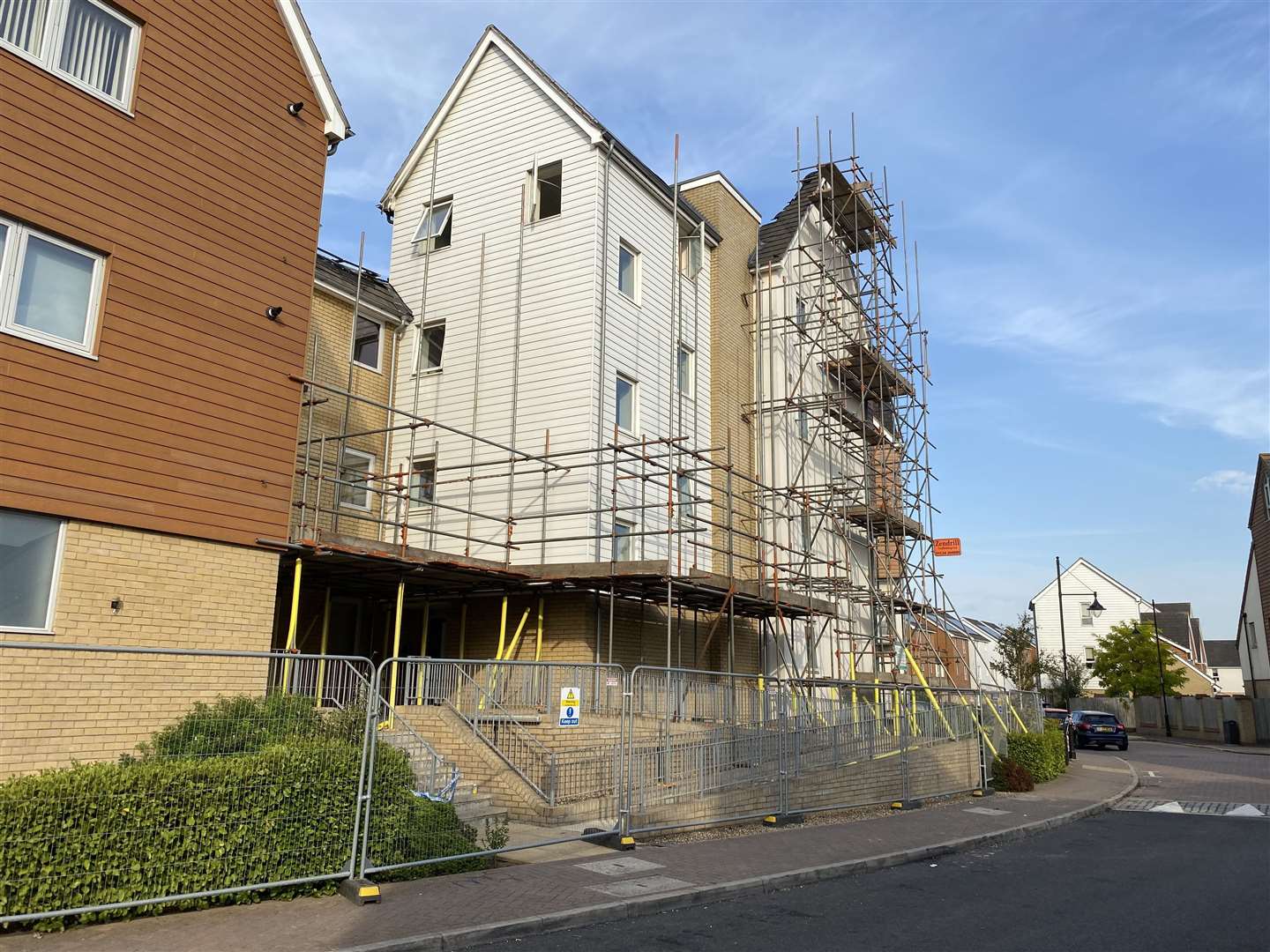 The building is now locked up and covered in fencing and scaffolding