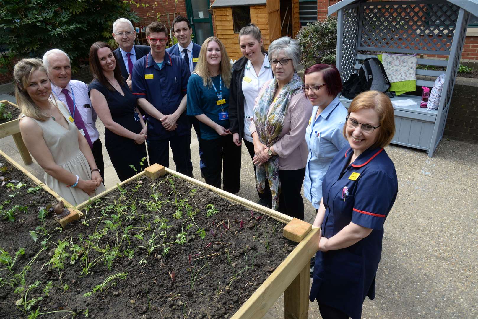 The working group at the opening of the dementia garden at the Medway Maritime Hospital on Wednesday. Picture: Chris Davey. (9488568)
