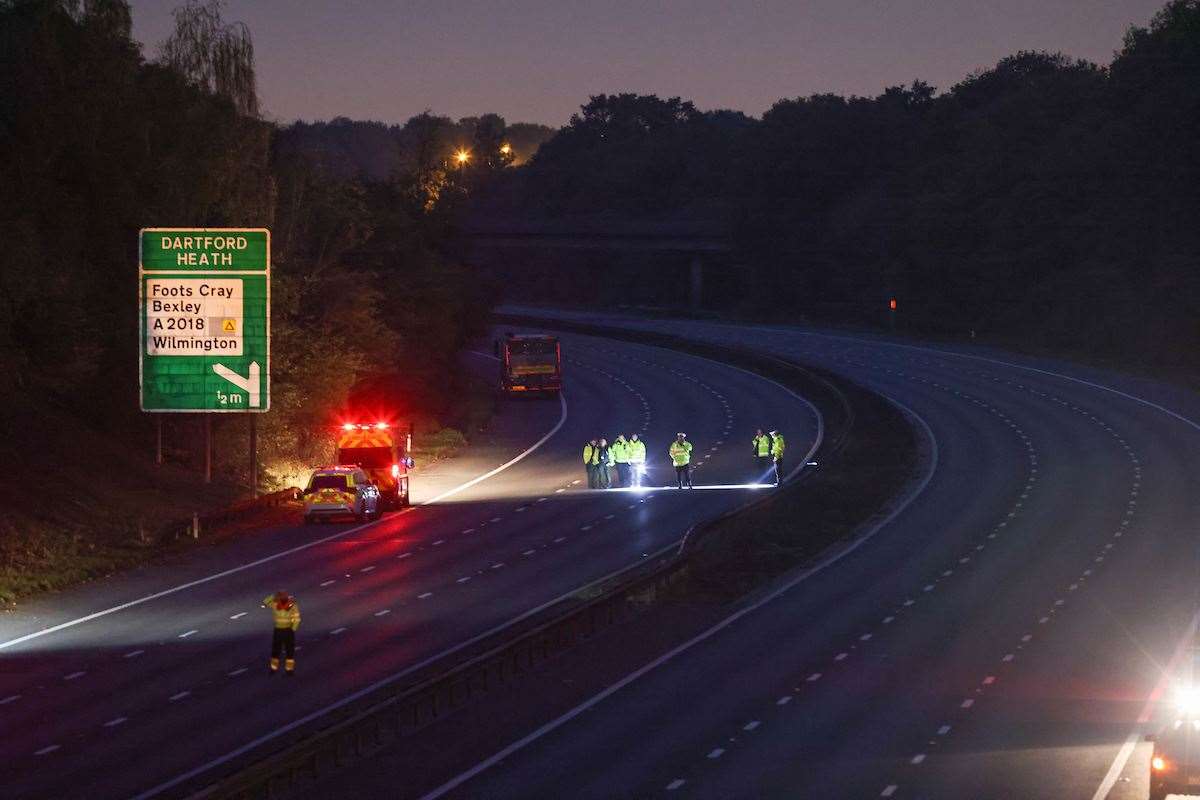 Officers attend the scene of the collision in the early hours of November 12, 2022. Image: UKNIP