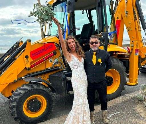 Bride Jessica with her JCB chauffeur. Picture: Diggerland