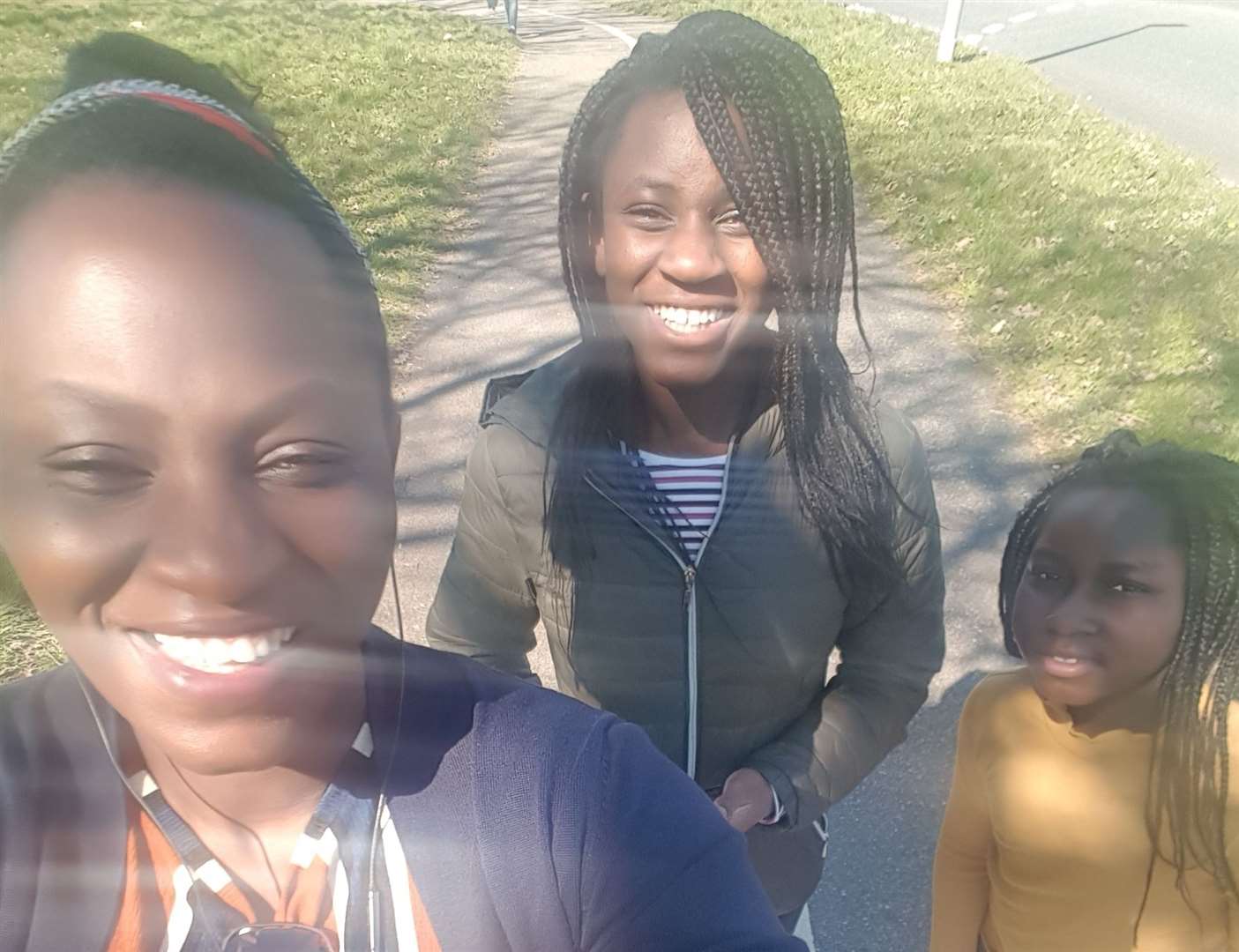 Oke Jacobs enjoying a walk with her two daughters