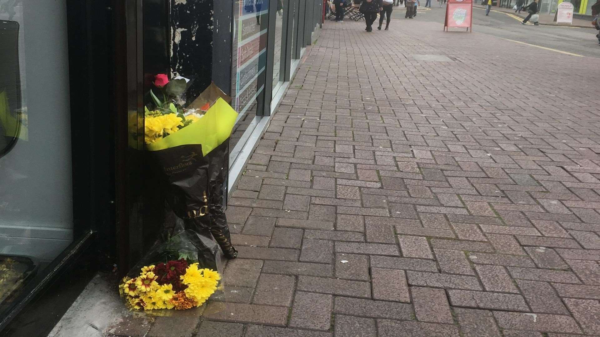 Floral tributes left outside McDonald's/Tesco in Week Street following Wayne Chester's death