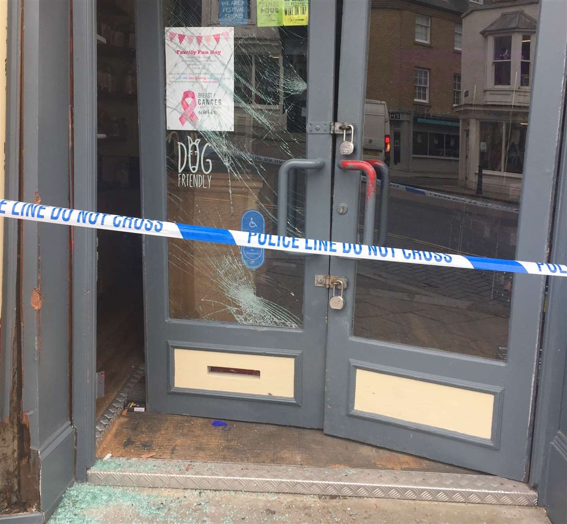 The smashed doors of The Offy in Whitstable High Street (16705568)