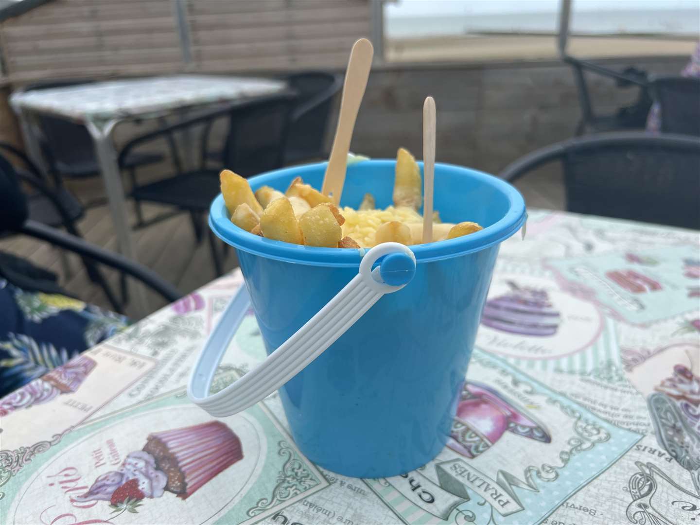 I'd never eaten out of a plastic bucket before - but you get to keep it and with a sandy beach within yards, who could resist going straight out to make a sandcastle?