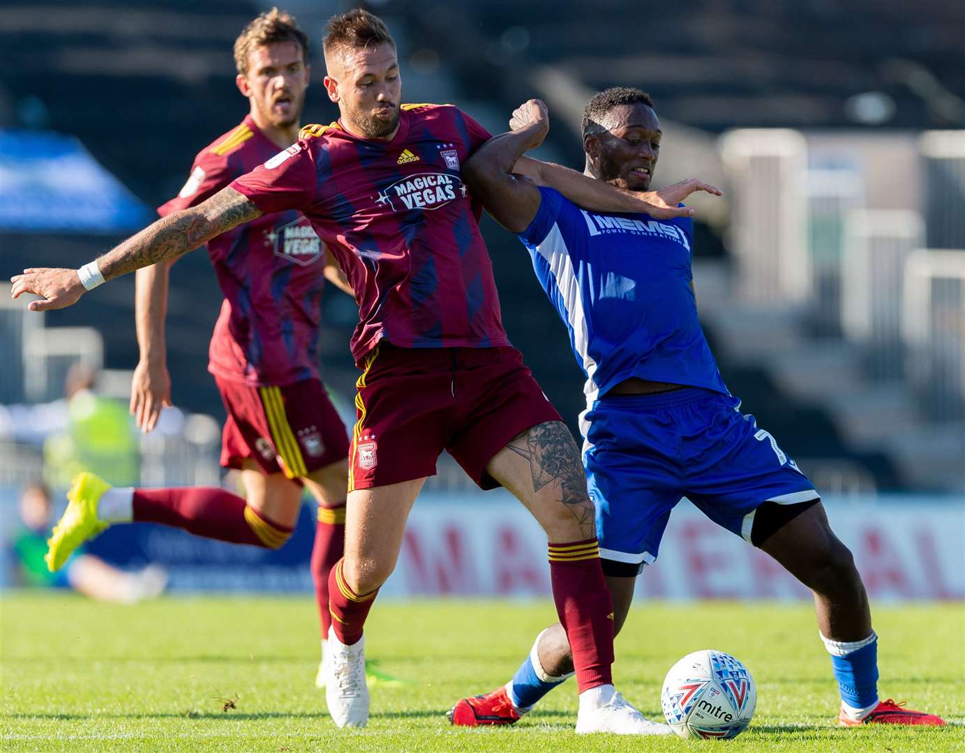 Gillingham forward Brandon Hanlan is challenged by Ipswich's Luke Chambers Picture: Ady Kerry