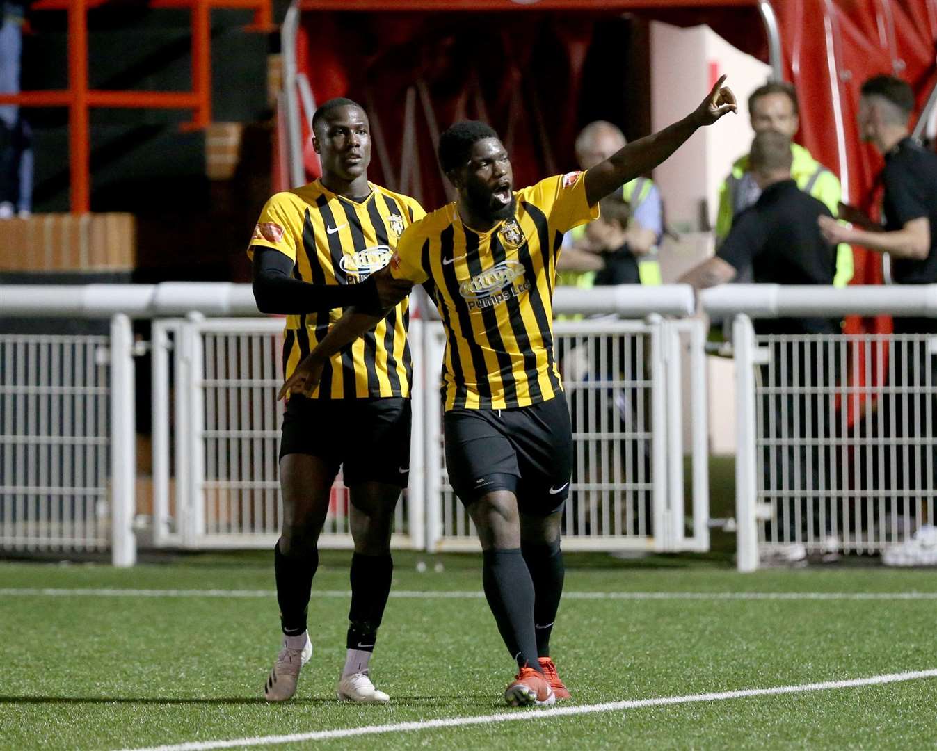 Folkestone striker David Smith celebrates with Ade Yusuff after making it 2-2 Picture: PSP Images