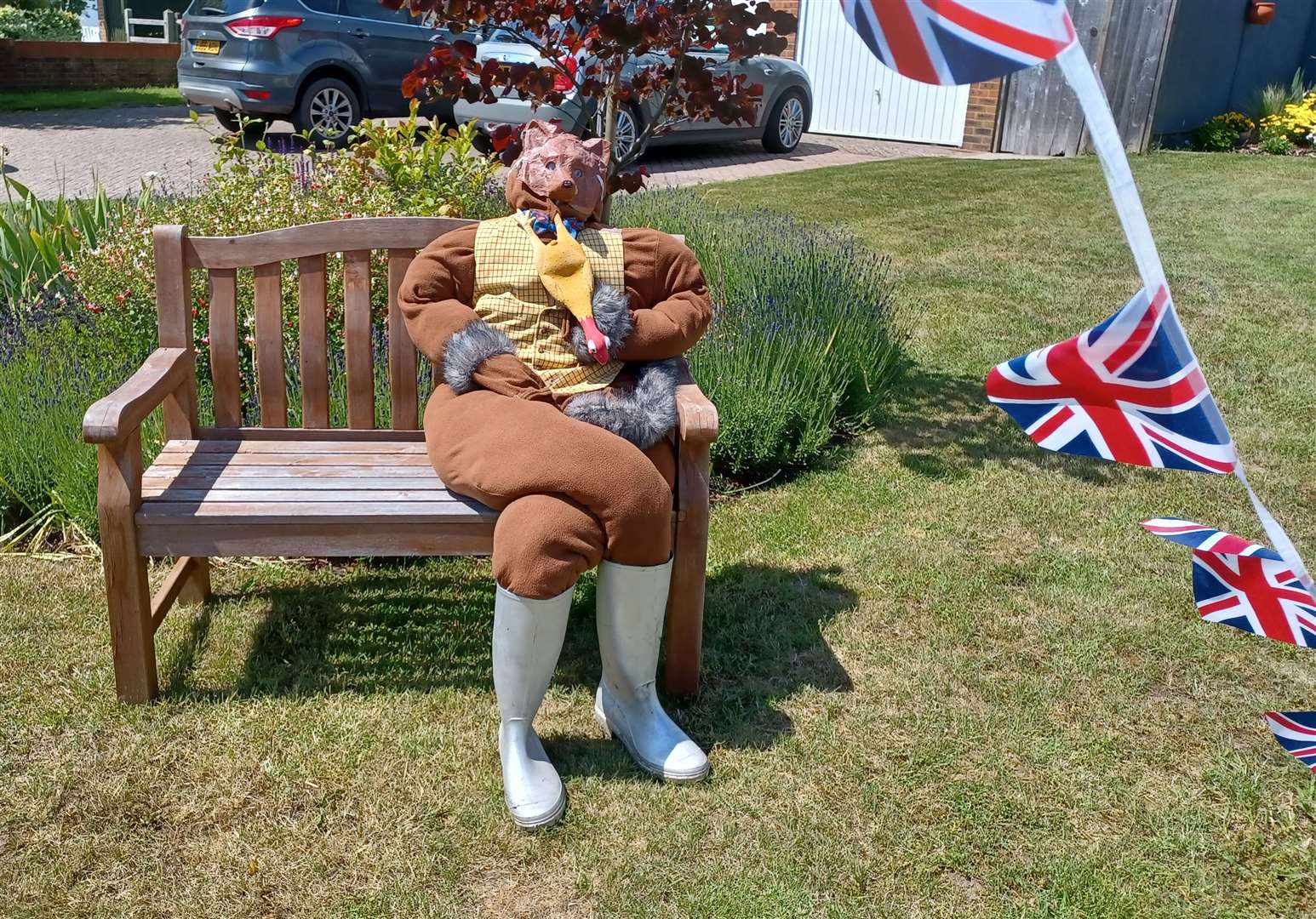 A fox in wellies, eating a chicken and surrounded by bunting is one of the quirkier creations