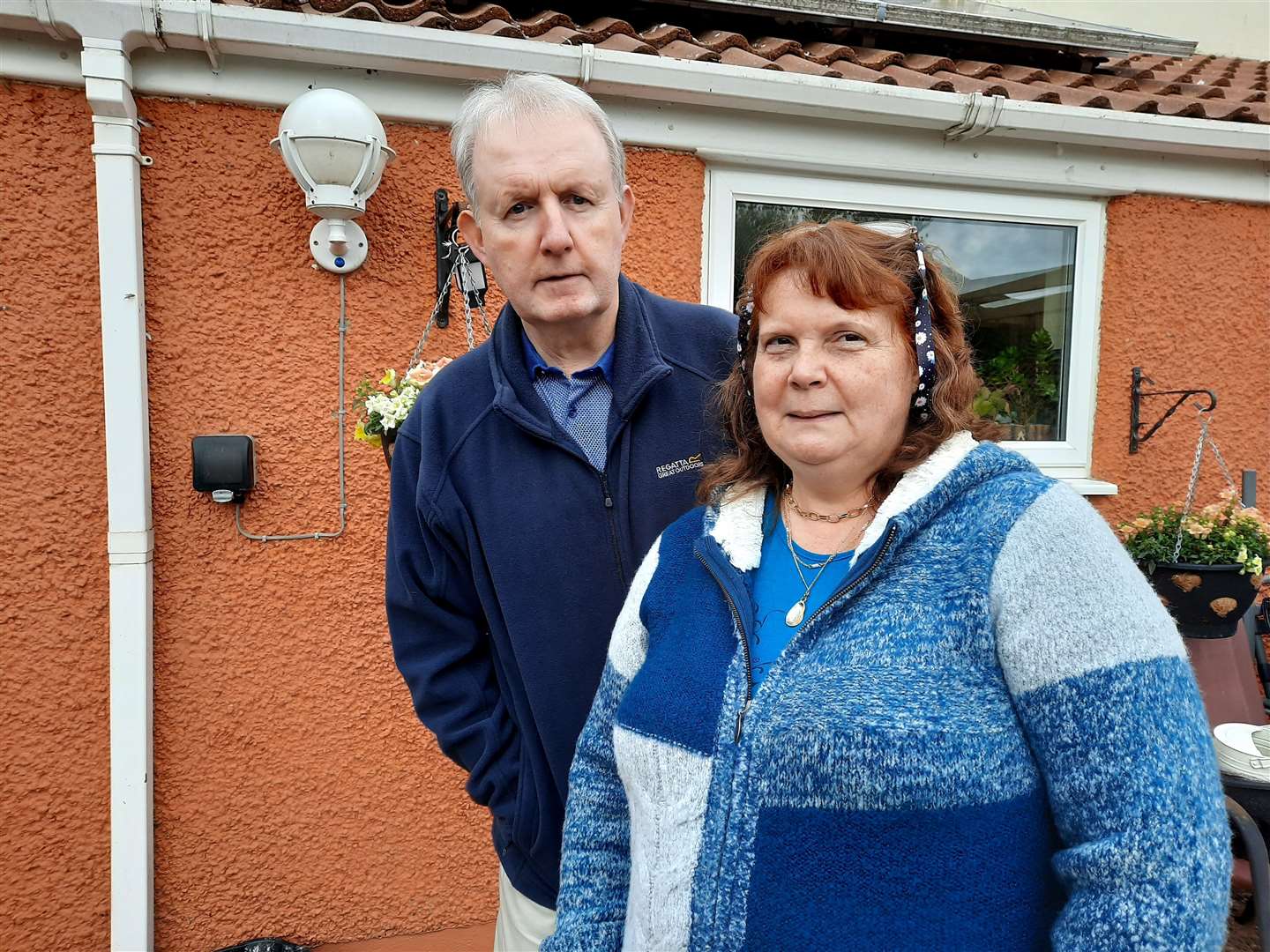 Leigh and David Stevenson stood behind their Reculver Road home