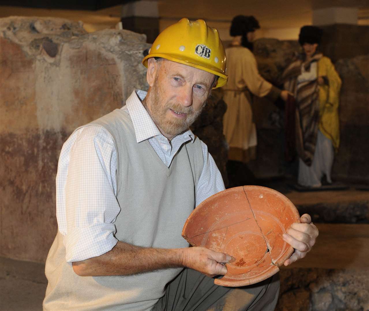 Dr Brian Philp MBE with a Roman bowl found on the site of the Roman Painted House. Picture: Tony Flashman