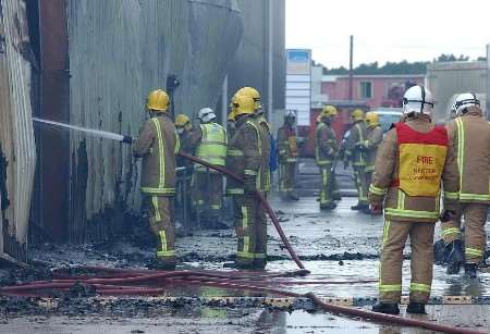 Firefighters getting to grips with the blaze. Picture: TERRY SCOTT