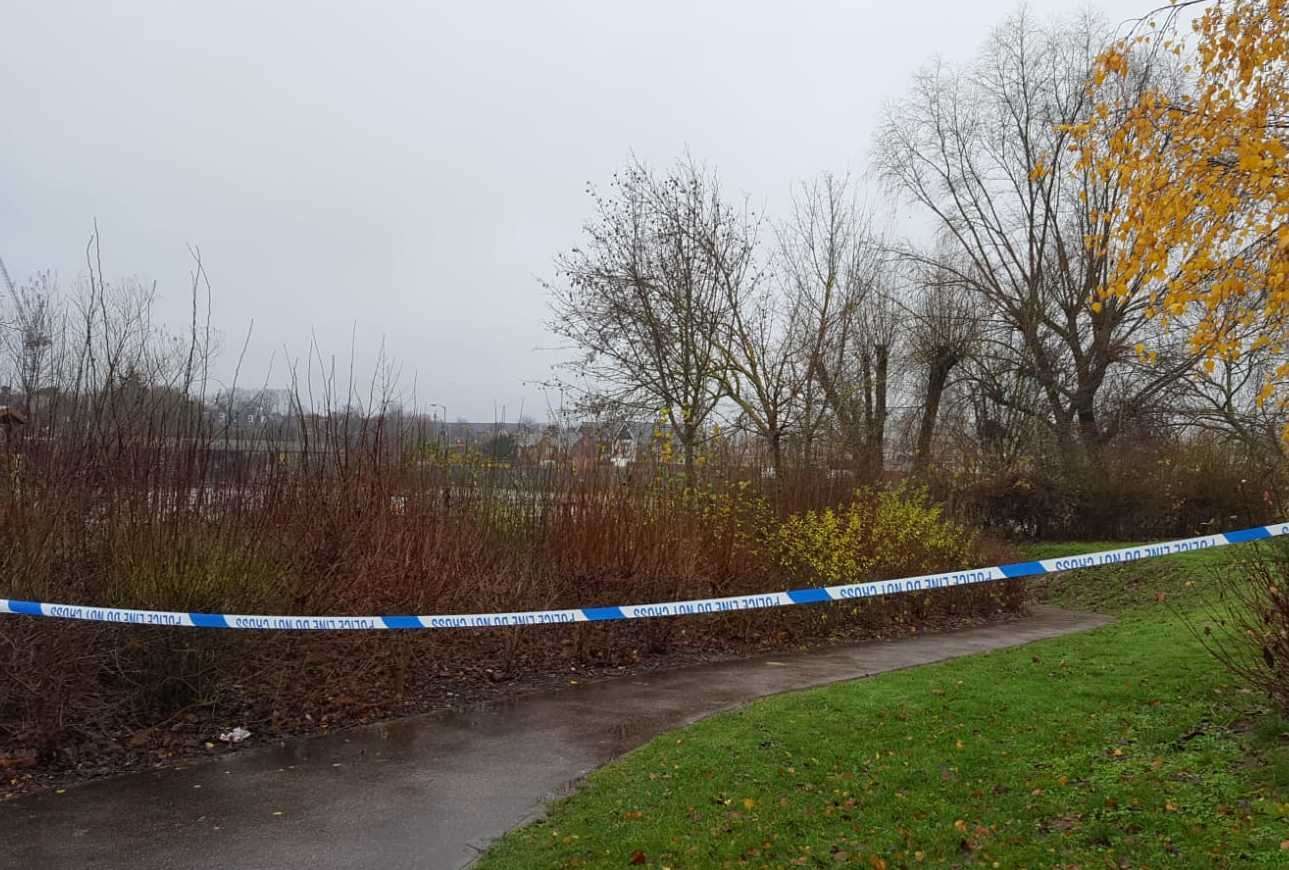 A taped-off section of riverside path