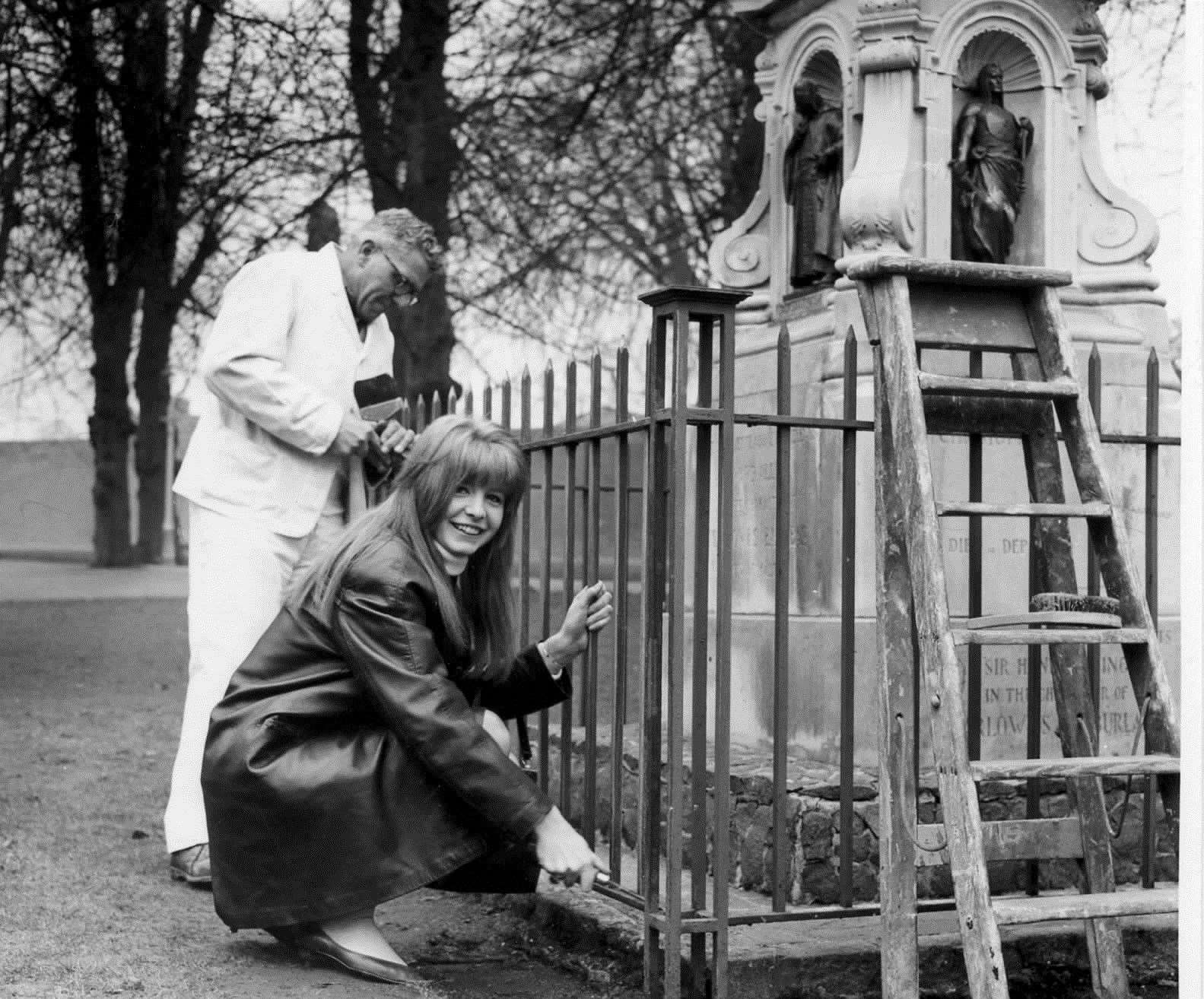 Actress Jane Asher, 17, (then girlfriend of Paul McCartney) poses by the Kitty Marlowe memorial (then in Dane John) in February 1964. She was in Canterbury to star in The Jew of Malta, the play by Christoper Marlowe being produced at the old Marlowe Theatre to mark the 400th anniversary of his birth. During the play's run, and with Beatlemania at it's height, McCartney was smuggled into the theatre by Kentish Gazette staff one night so that he could watch her performance unrecognised