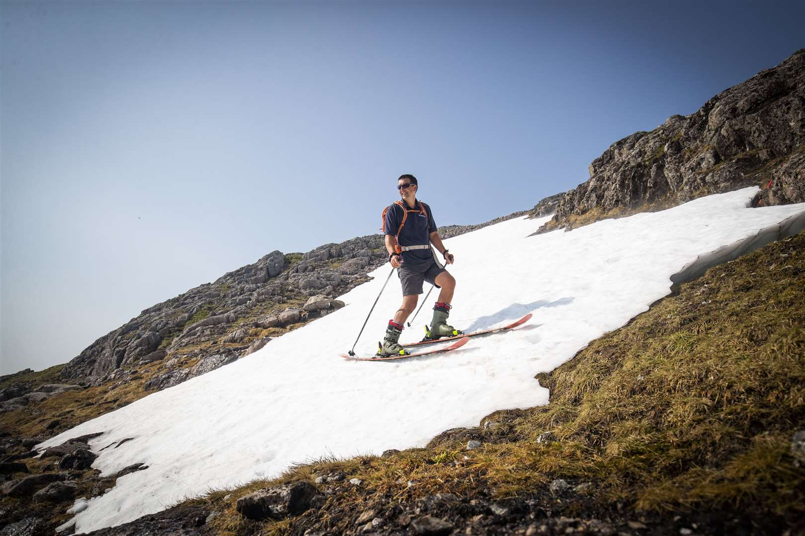 It might have been the hottest day of the year in some parts, but small patches of snow remain on the hills of Glencoe in the Highlands (Jane Barlow/PA)