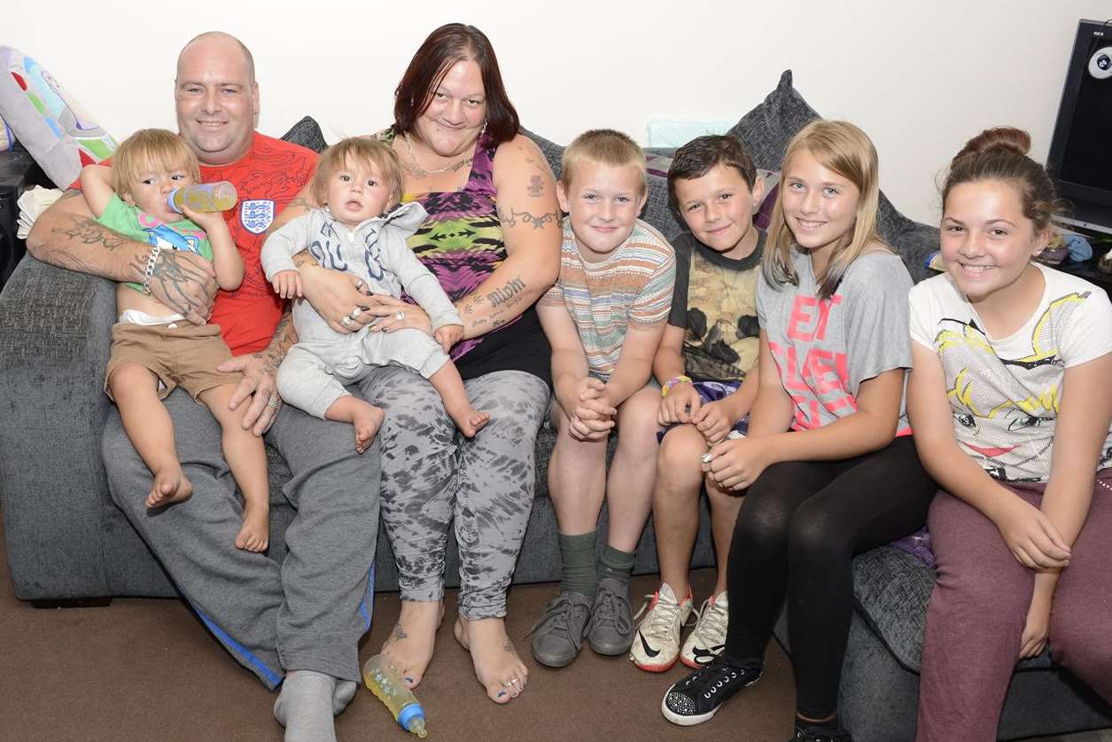 Attack victim Wayne Morton back at home with wife Kelly and (from left) children Leland and Declan, nephew Bradley, son Jack, niece Shannon and daughter Megan