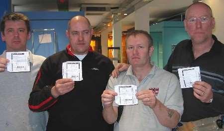 UPSET: Dean Kenworthy, Paul Baker, Gary Spacey and David Starkie with their betting slips. Picture: MATT HOOPLE