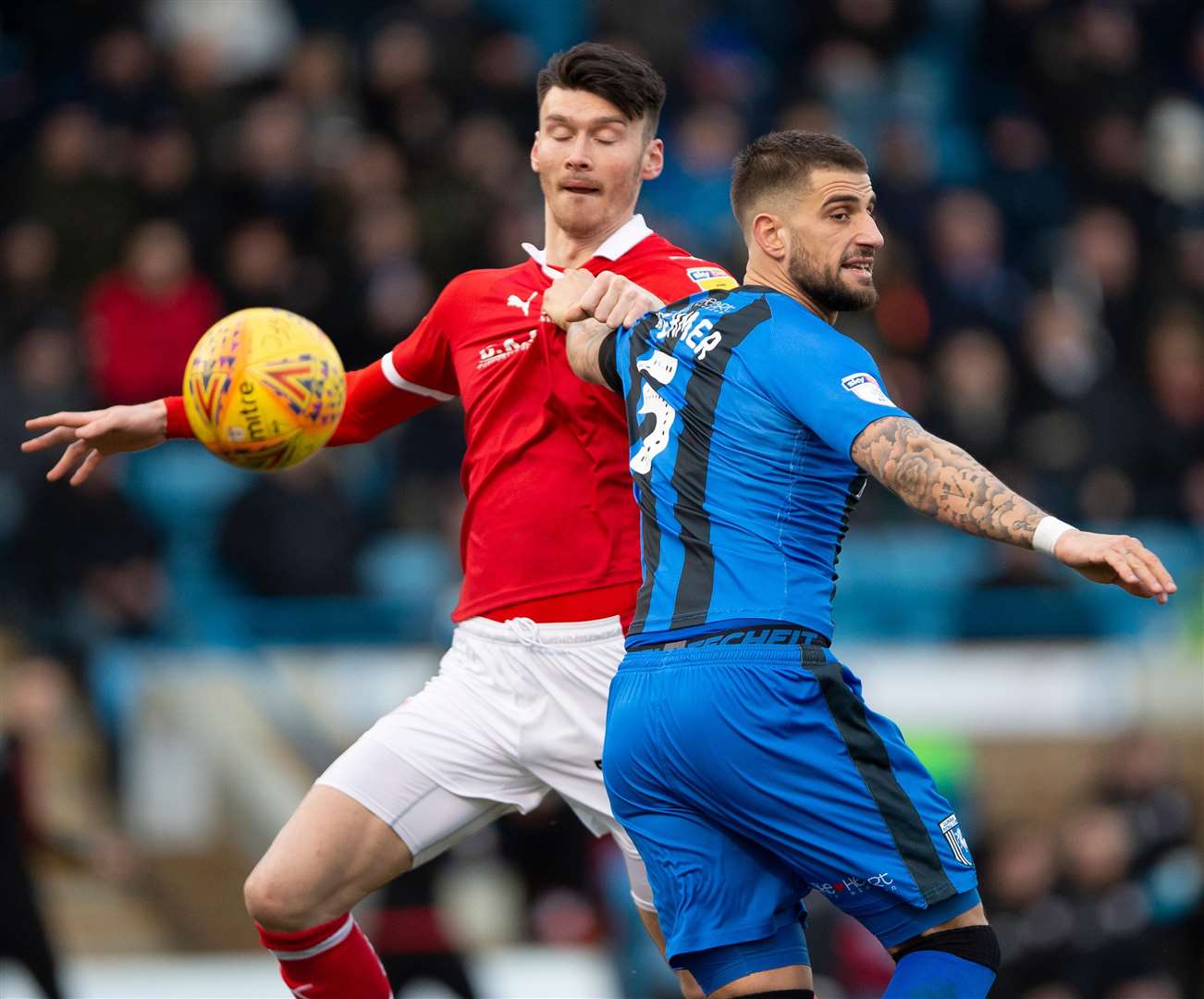 Max Ehmer prevents Kieffer Moore from getting to the ball Picture: Ady Kerry
