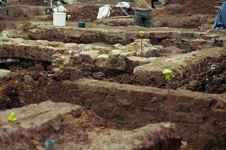 Archaeological dig behind the hoardings in St Dunstan's, Canterbury, on the corner of Station Road West