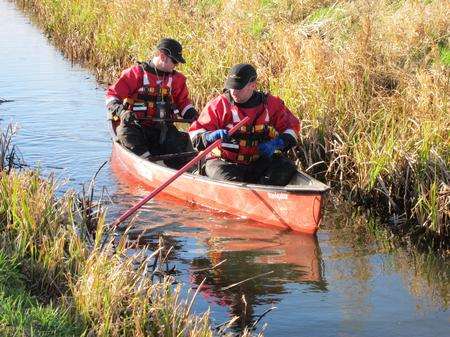 Kent Search and Rescue vounteers have been using canoes to navigate the miles of narrow waterways in the search for missing John Harvey.