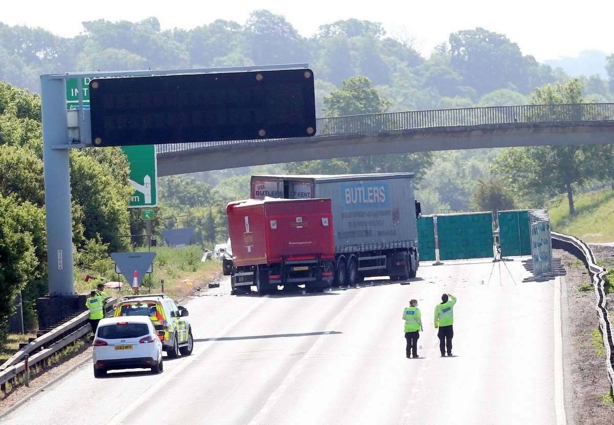 Crash investigators on the A2 near Dartford where two lorries collided. Picture: UKNIP