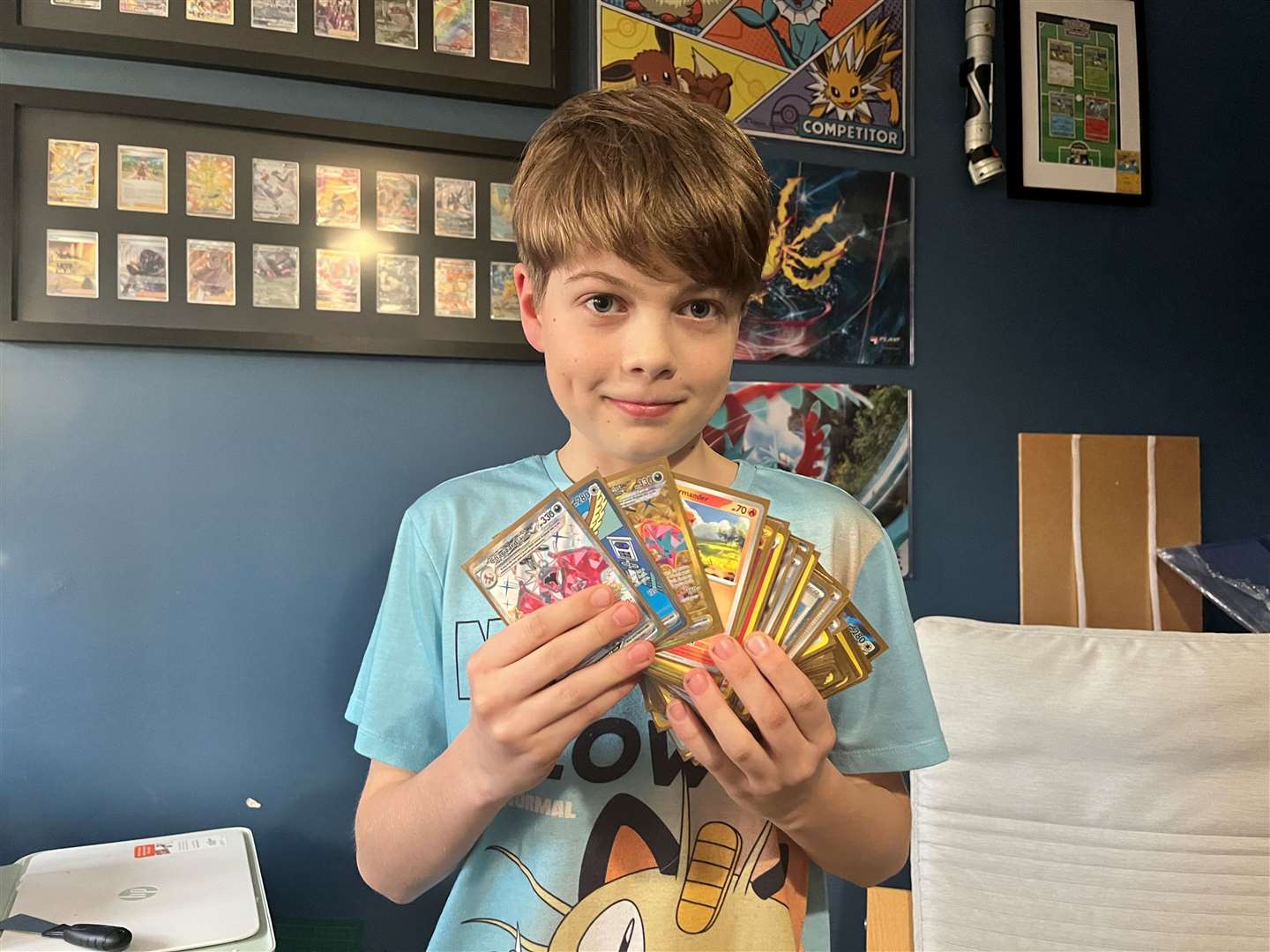 Harrison says he has about 10,000 Pokémon cards in his collection