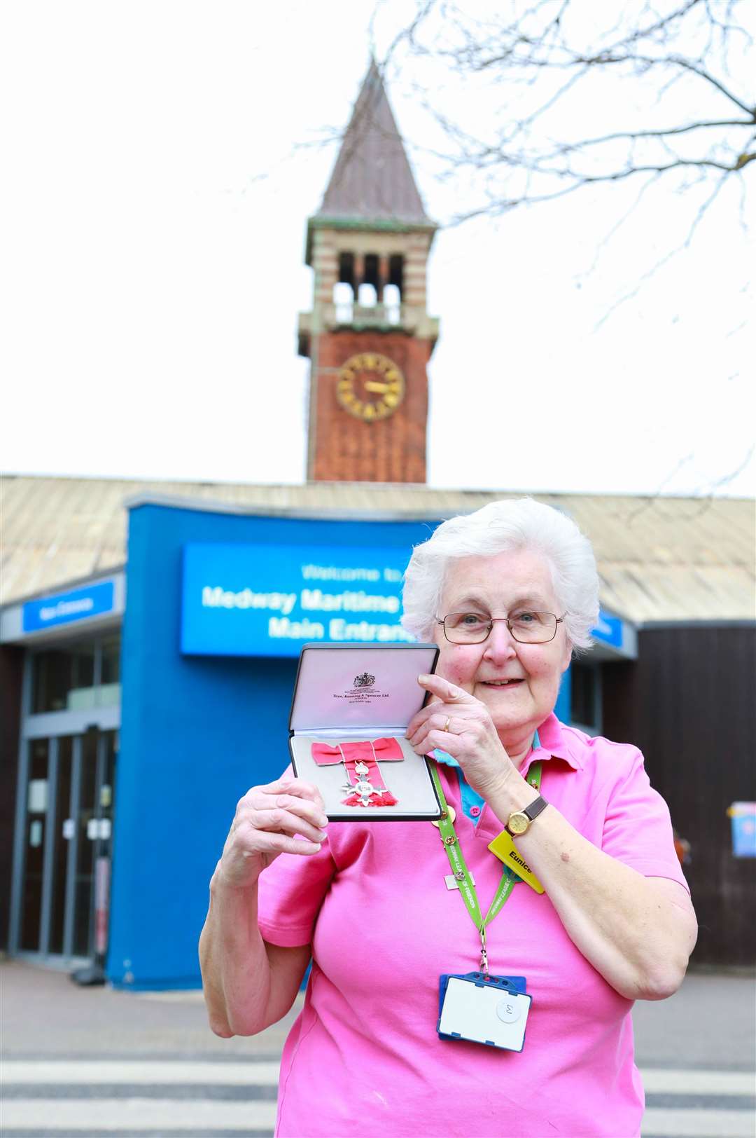 Hospital radio volunteer Eunice Norman with her MBE medal outside Medway Maritime in Gillingham