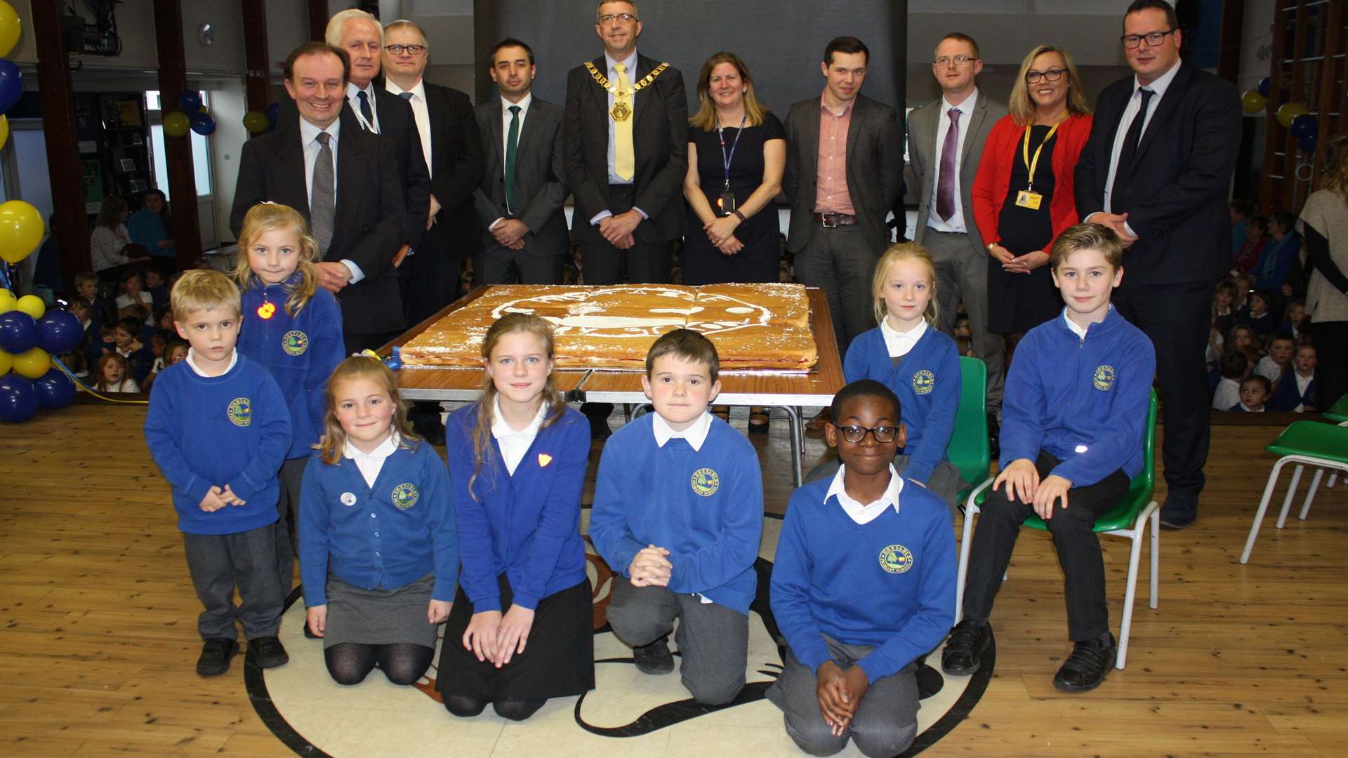 Staff, pupils and some special guests marked a £2.6m makeover at Hextable Primary School with a giant cake