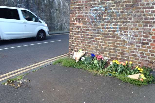 Flowers have been left at the scene by the viaduct in Foord Road, Folkestone