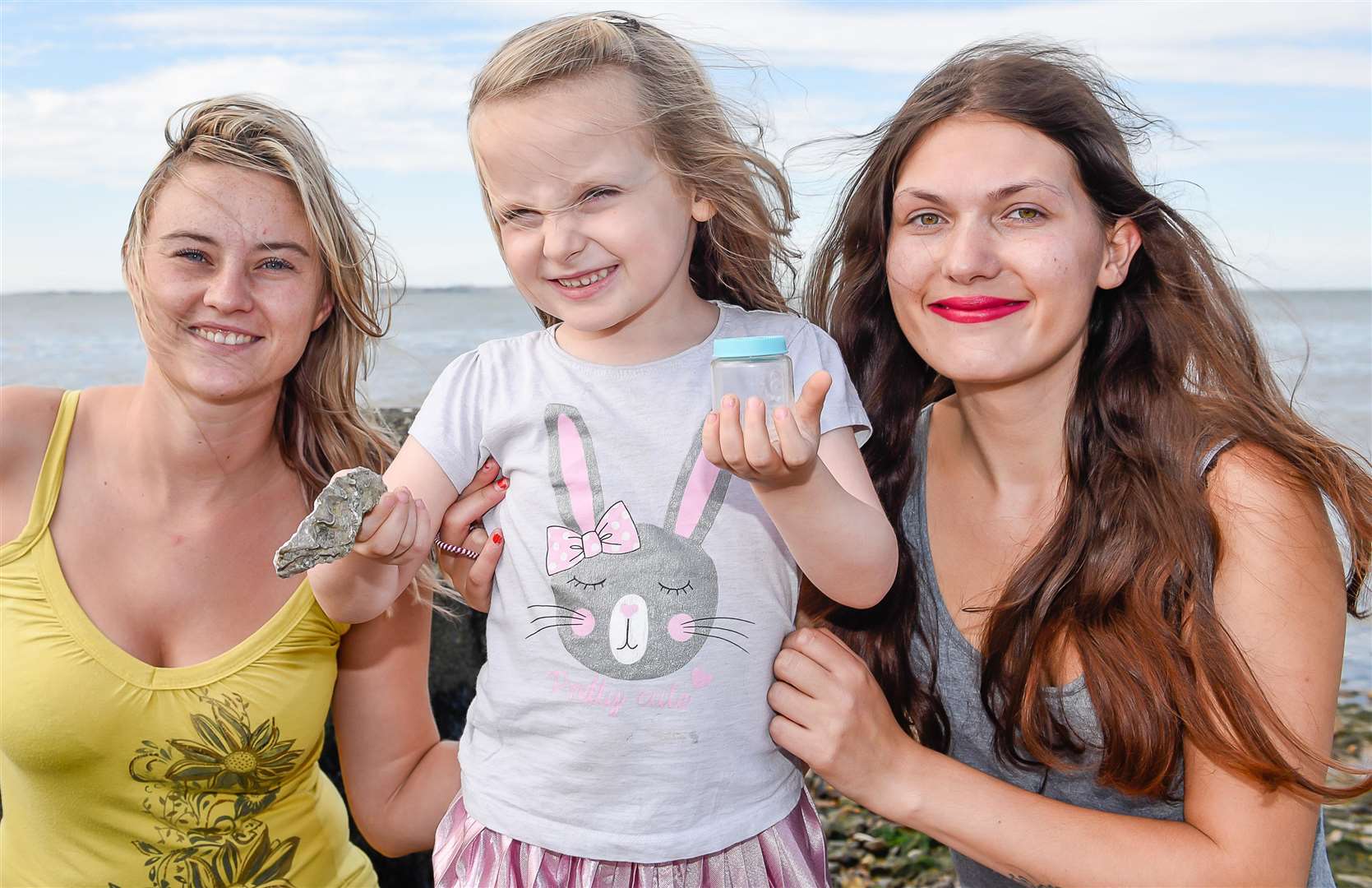Nicole Payne, Lilley Fahey, five, and Zoe Bonner found pearls in an oyster