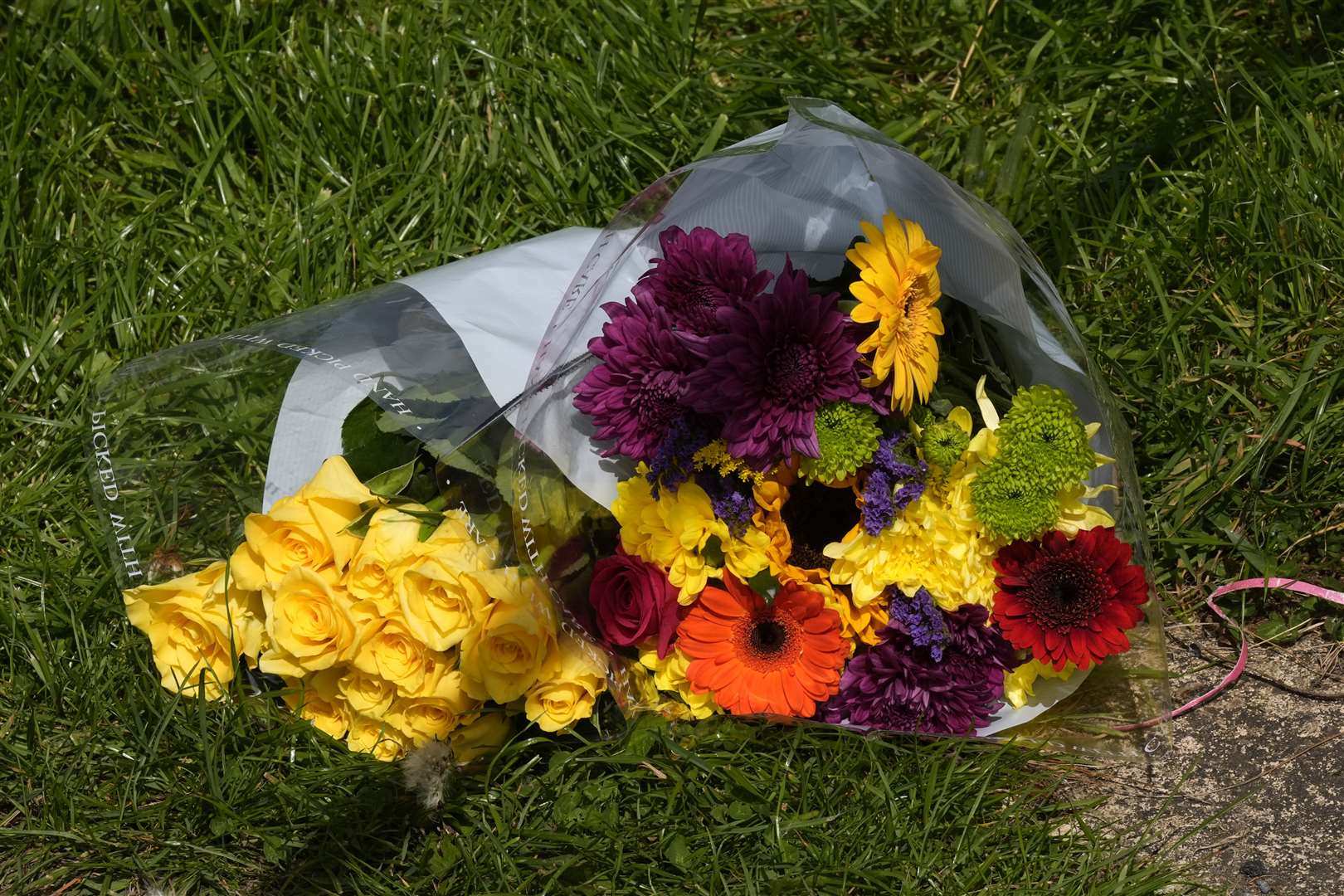 A floral tribute at the scene of the house fire in Bradford (Danny Lawson/PA)